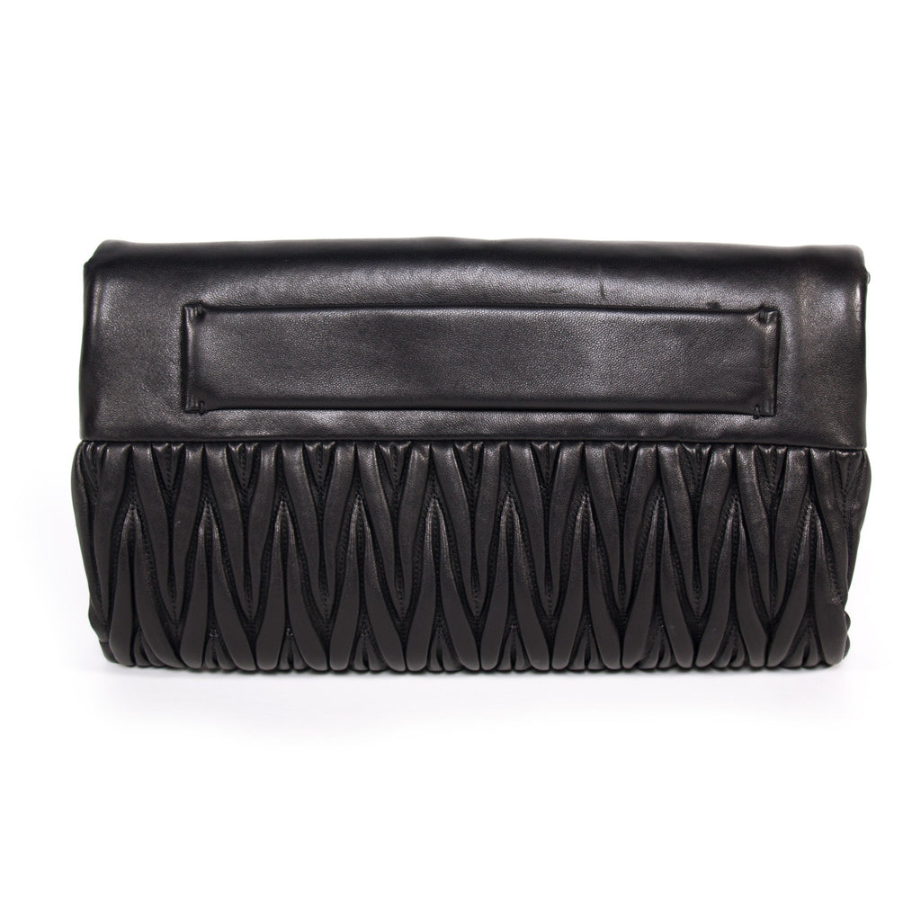 Miu Miu Matelassé Pochette Bags Miu Miu - Shop authentic new pre-owned designer brands online at Re-Vogue