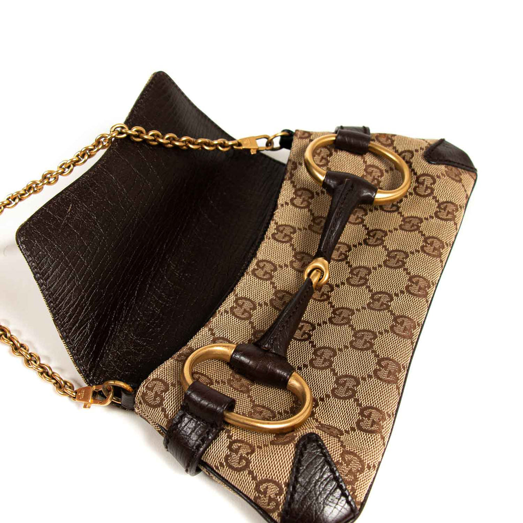 Gucci GG Canvas Horsebit Clutch Bags Gucci - Shop authentic new pre-owned designer brands online at Re-Vogue