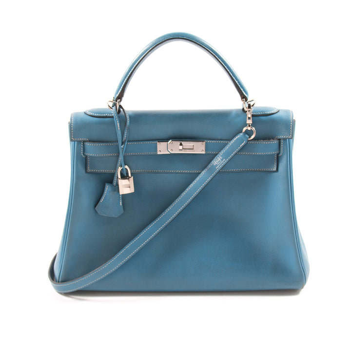 Hermès Kelly 32 Retourne Bleu Jean Swift Bags Hermès - Shop authentic new pre-owned designer brands online at Re-Vogue