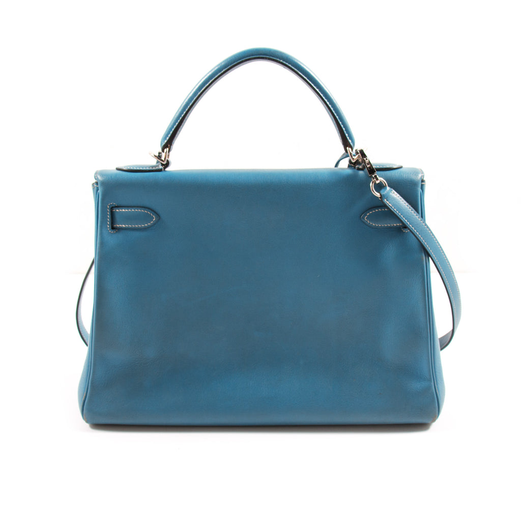 Hermès Kelly 32 Retourne Bleu Jean Swift Bags Hermès - Shop authentic new pre-owned designer brands online at Re-Vogue