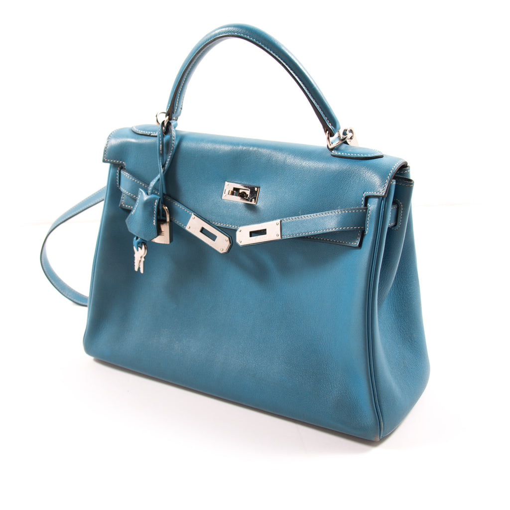 Hermès Kelly 32 Retourne Bleu Jean Swift Bags Hermès - Shop authentic new pre-owned designer brands online at Re-Vogue