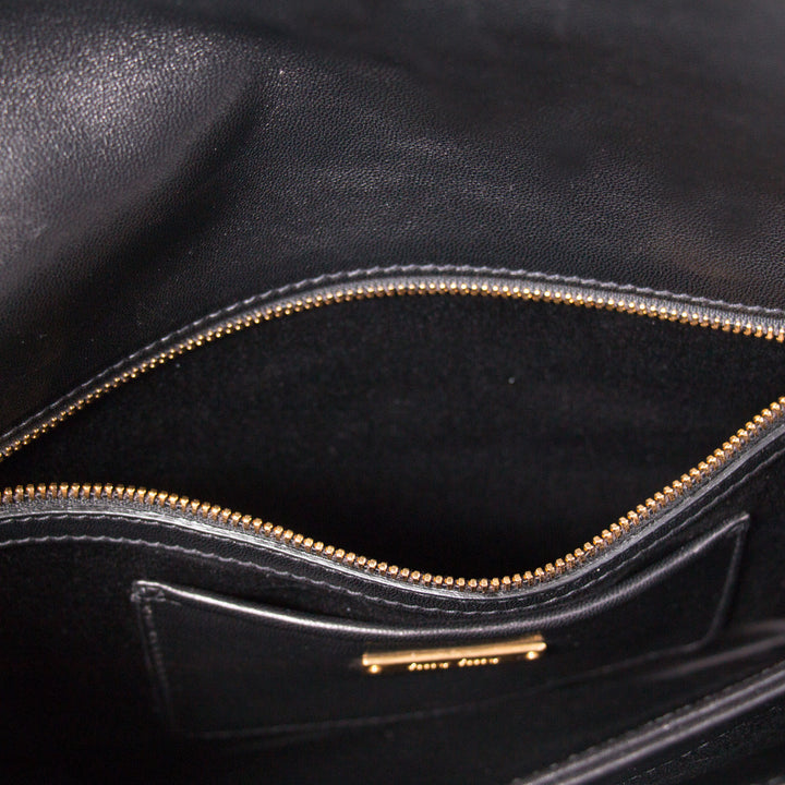 Miu Miu Matelassé Pochette Bags Miu Miu - Shop authentic new pre-owned designer brands online at Re-Vogue