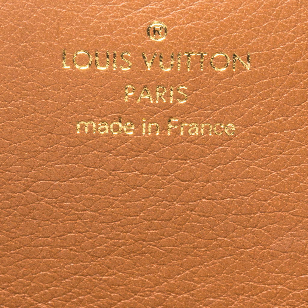 Louis Vuitton Elysee Clutch - revogue