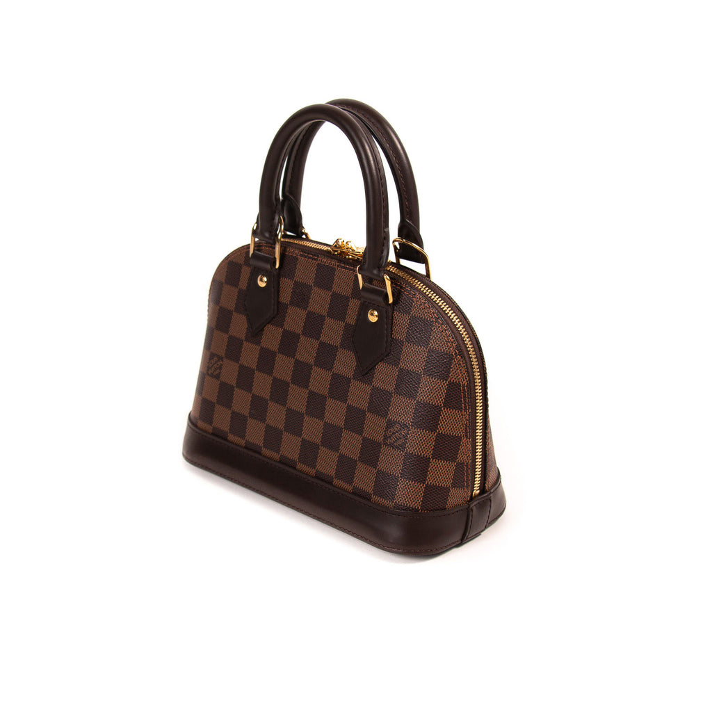 Louis Vuitton Damier Ebene Alma BB Bags Louis Vuitton - Shop authentic new pre-owned designer brands online at Re-Vogue