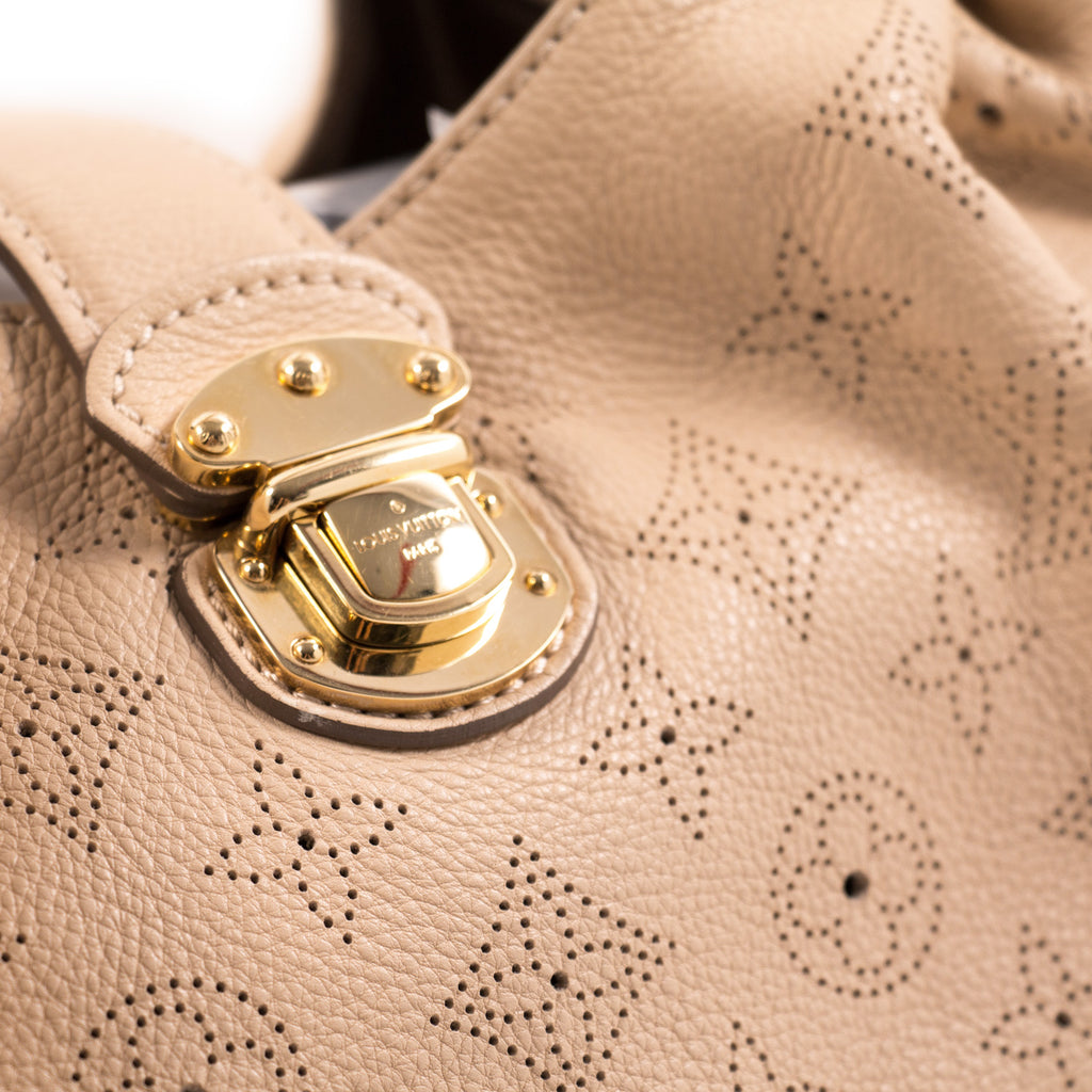 Louis Vuitton Monogram Mahina L Hobo Bag Bags Louis Vuitton - Shop authentic new pre-owned designer brands online at Re-Vogue
