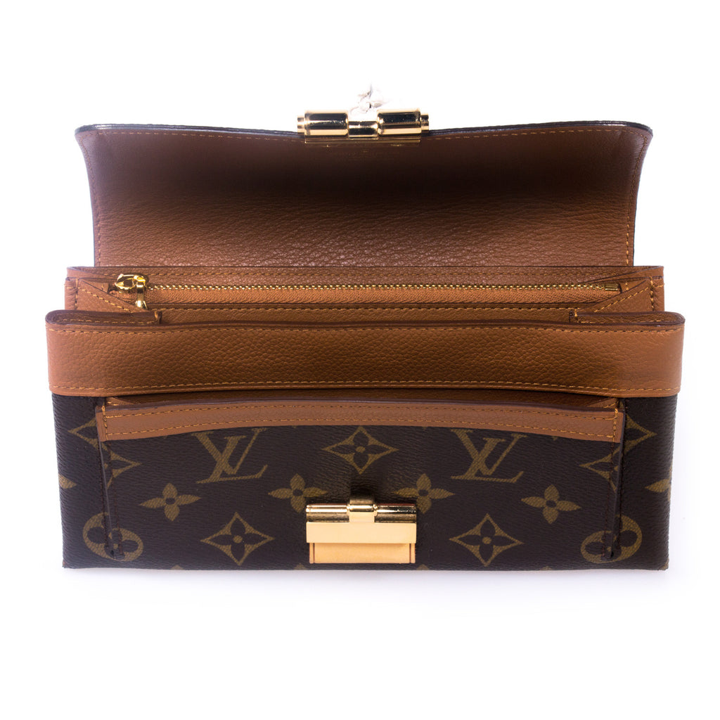 Louis Vuitton Elysee Clutch - revogue